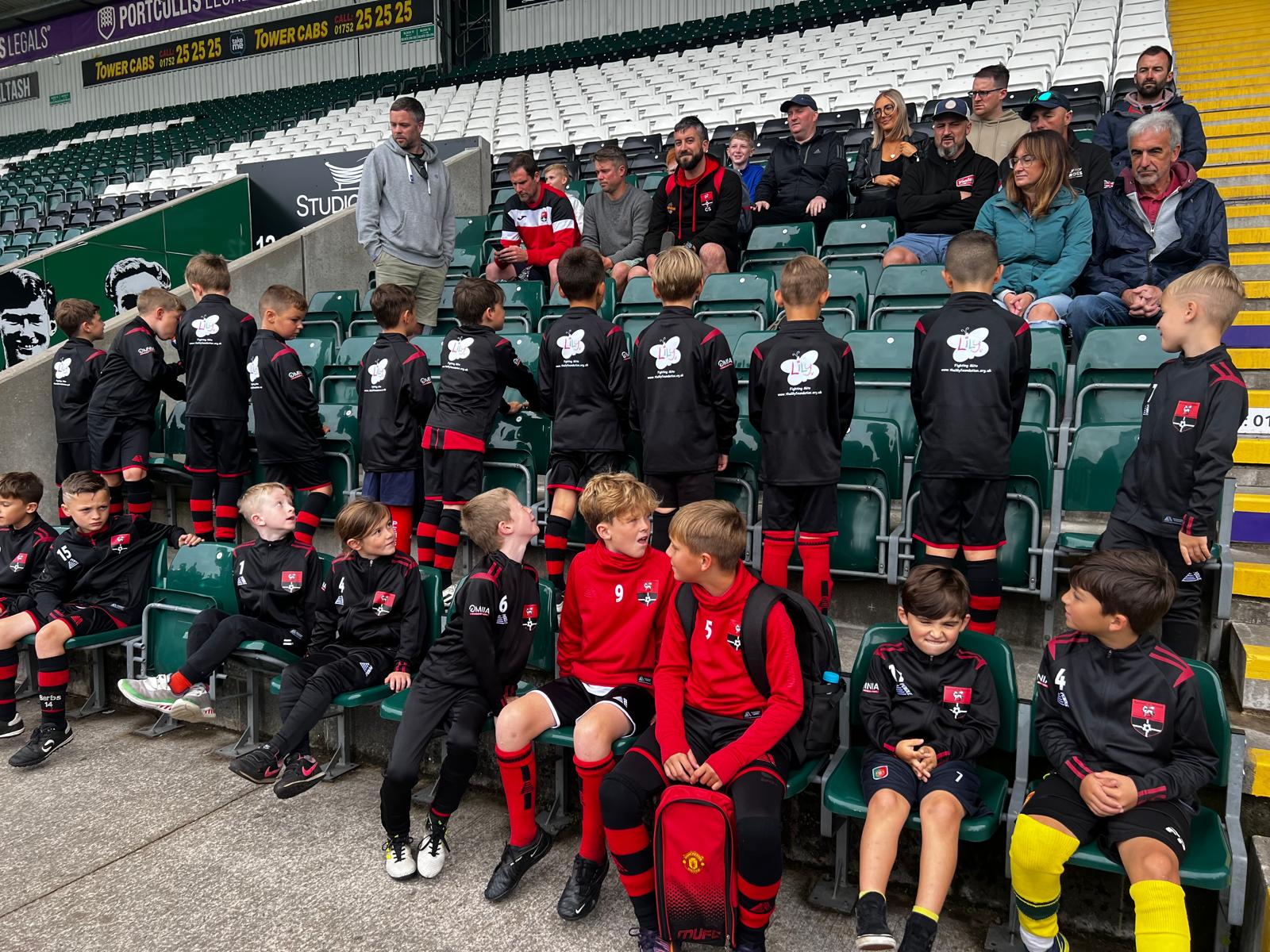 Redruth United youth players in the stands at Plymouth Argyle's Home Park